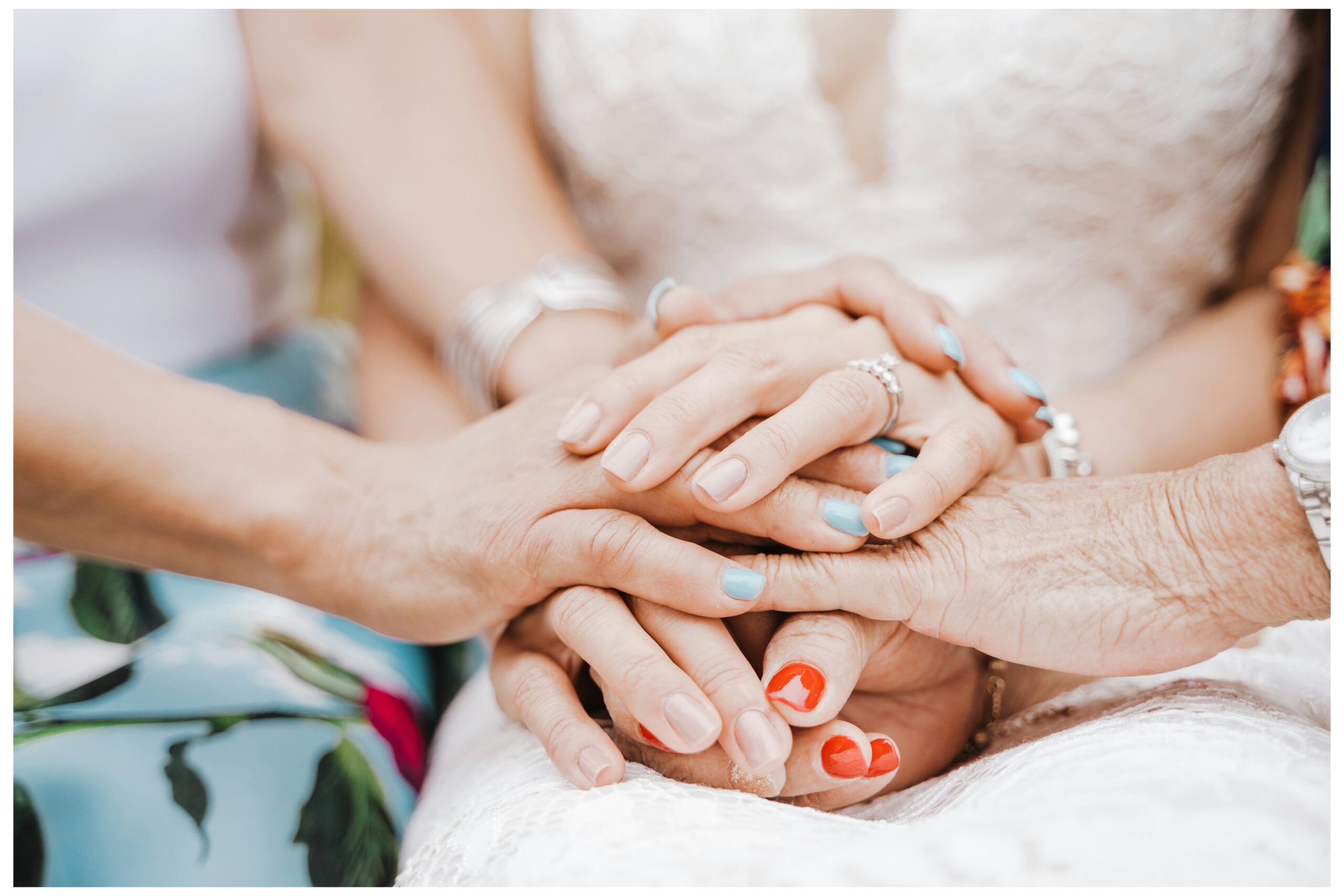 Family members of different ages holding hands